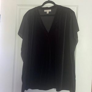 V-neck, short sleeve blouse.